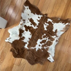 Brown and White Cowhide Rug